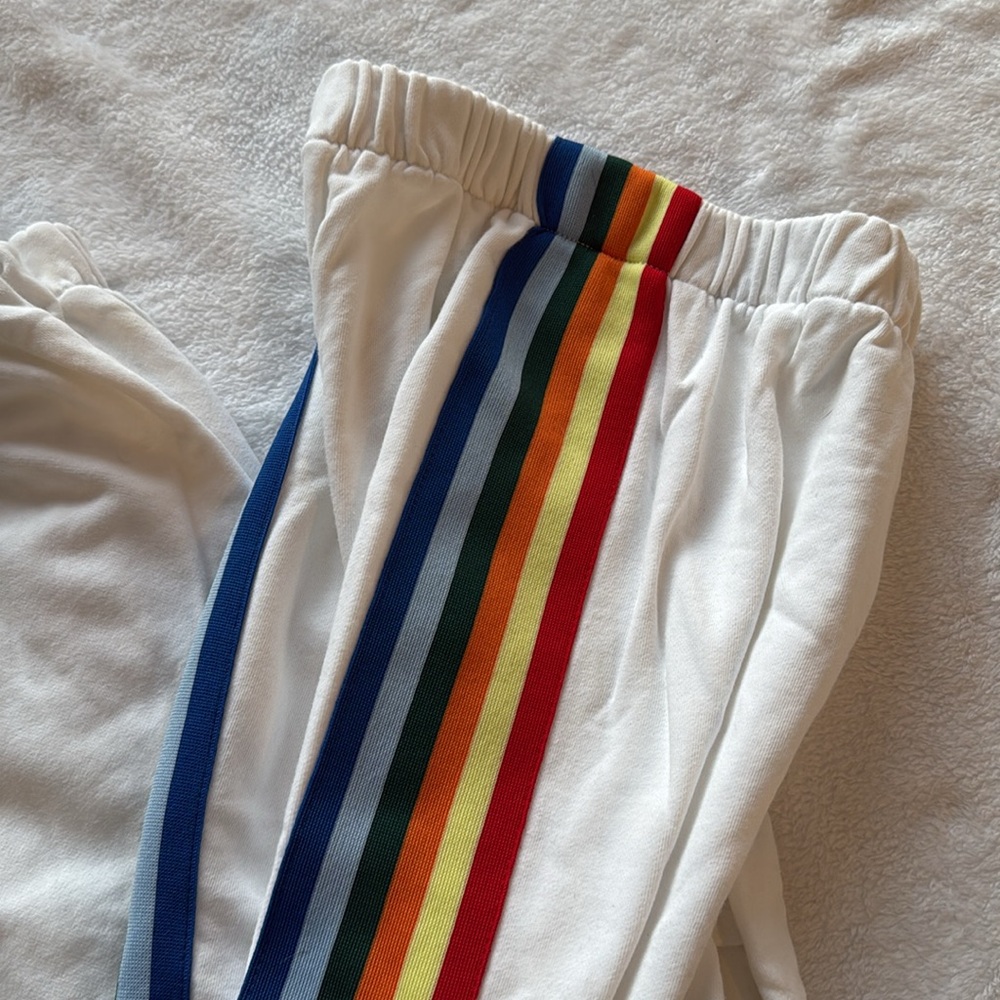 White sweatpants with rainbow stripes